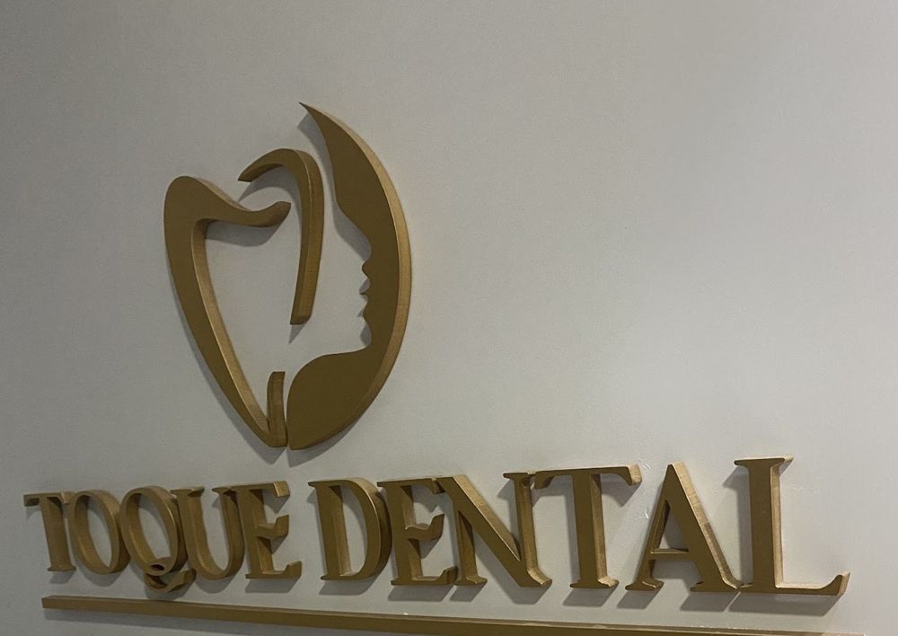 Letreiro da Toque Dental: odontologia estética e harmonização facial